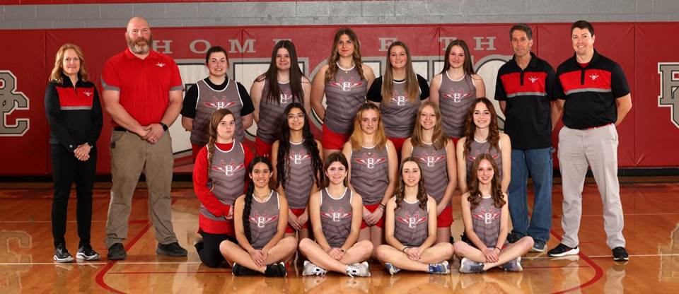 A group of girls basketball team posing for a photo

Description automatically generated