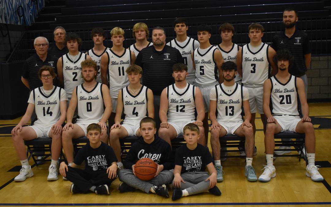 A group of men in basketball uniforms posing for a photo

Description automatically generated